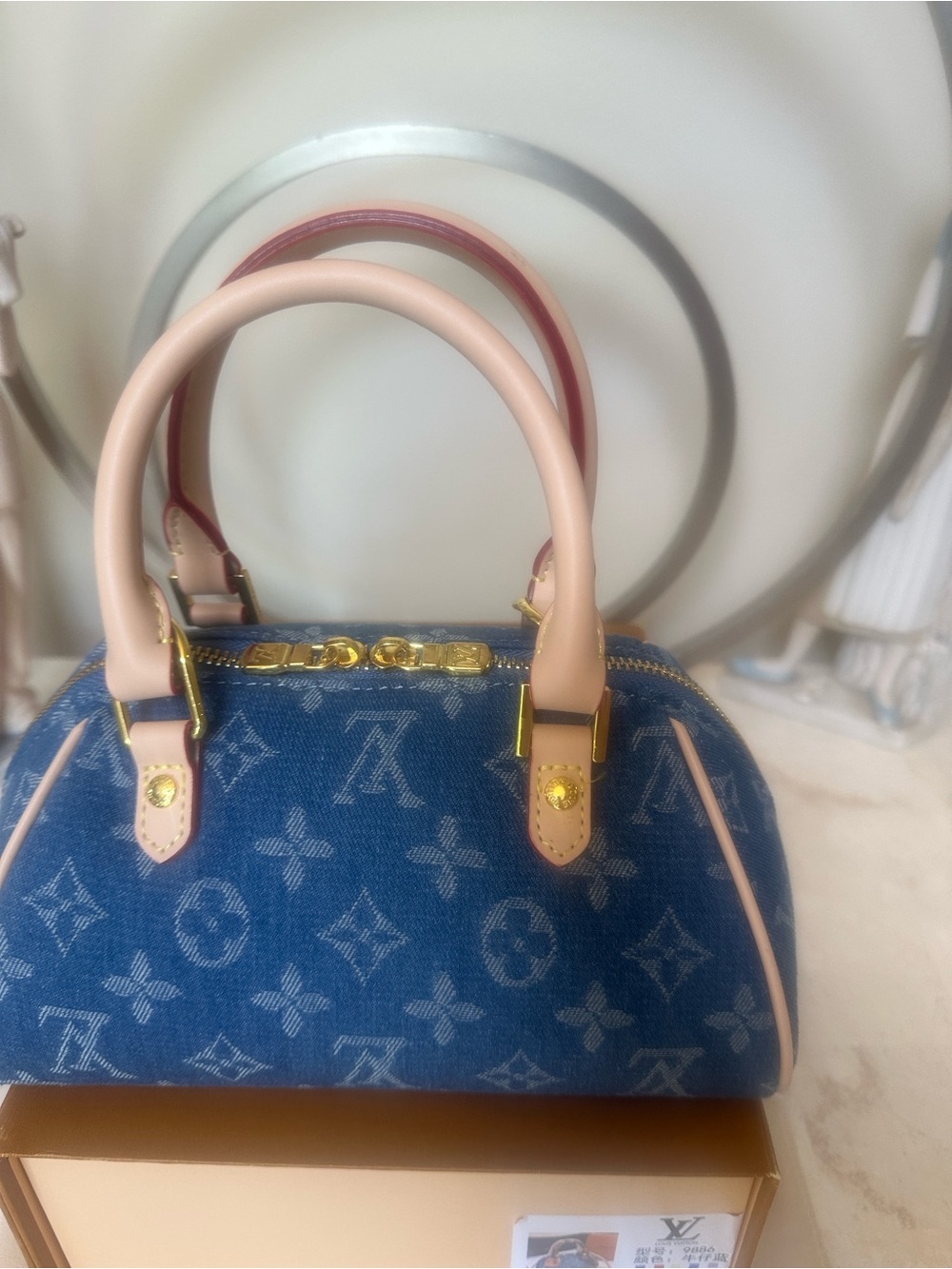Lux inspired Nano Speedy bag is blue monogram denim. - Picture 5 of 16